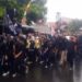 Aksi damai di Kuningan, hujan deras mengguyur sepanjang aksi